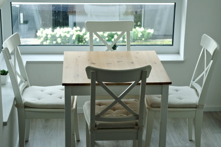 light table with chairs. kitchen table High quality photo