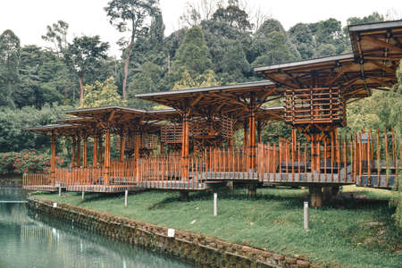 Wooden Treetop houses in the Perdana Gardens by the lake in Kuala Lumpur Malaysiaのeditorial素材