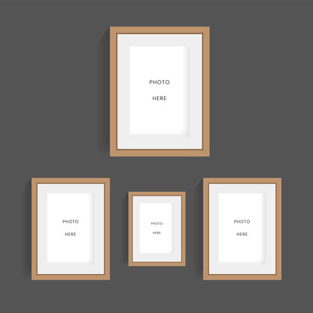 Set of four wooden frames of pictures on the dark wall mock up designs, modern groups of picture frames vector designs on the wall  mock up vector illustrationのイラスト素材