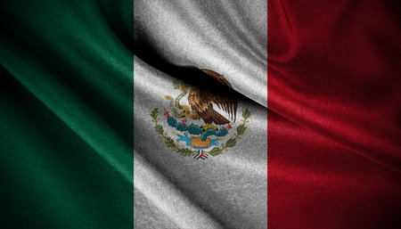 Mexico flag blowing in the wind isolated. Official state symbol of Mexico.の写真素材