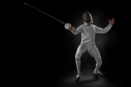 male fencer in actionの写真素材