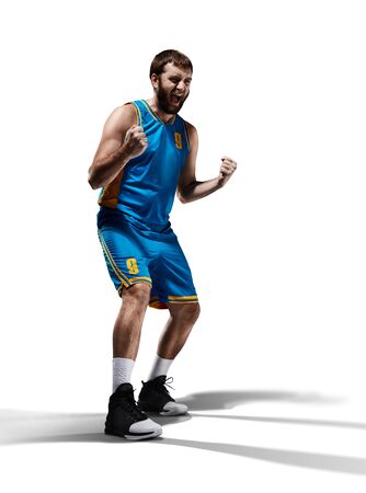 happy basketball player isolated in whiteの写真素材