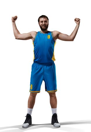 happy basketball player isolated in whiteの写真素材