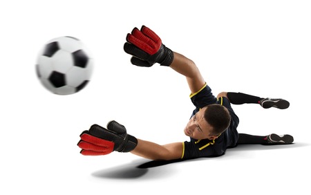 goakeeper reaching for the ball isolated on whiteの写真素材