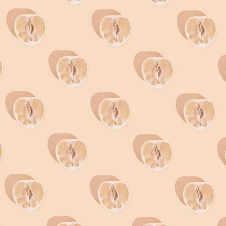 Creative pattern made of pomelo against a sandy earthy pastel background. Minimal food concept...