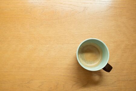 Coffee mug on wood table