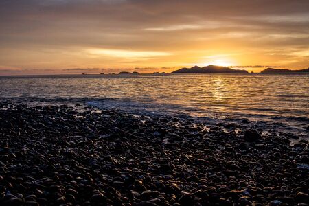 Sunset at pebble beachの写真素材