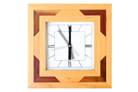 Wooden clock with motion hand isolated on whiteの写真素材