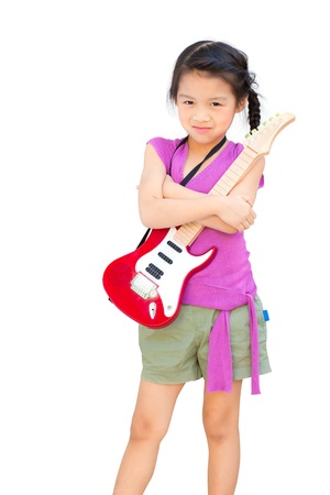 A girl with a guitar isolated on white backgroundの写真素材