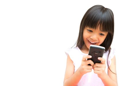 Little Girl with Mobile Phone Isolated on White Background の写真素材