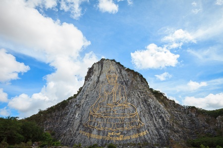 Carved buddha image of Khao Chee Jan, Pattaya Thailandの写真素材