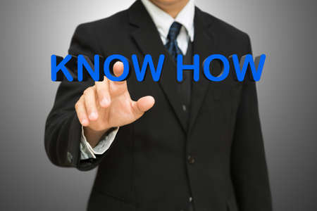 Businessman pressing know how 3d text, Business conceptの写真素材