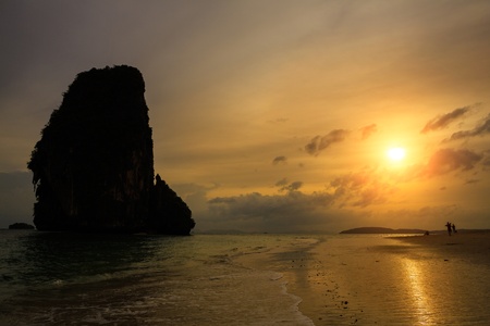 Tropical beach railay beach in krabi thailand at sunsetの写真素材