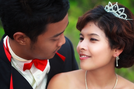 Loving asian couple faces in closeupの写真素材