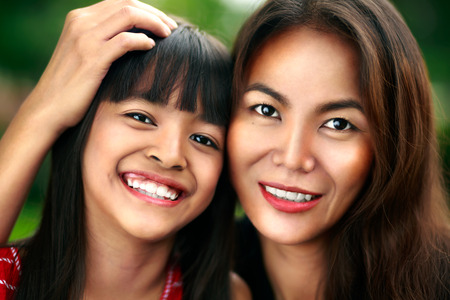 Happy mother and child girl, Cross processing color tone