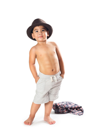 Adorable little asian boy posing, Isolated over whiteの写真素材