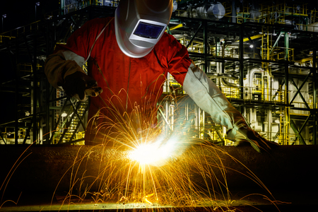 Closeup industrial Worker at the factory welding