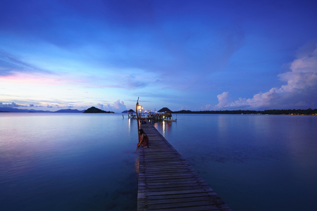 Wooden bridge at dusk Koh Mak, Trat Thailandの写真素材