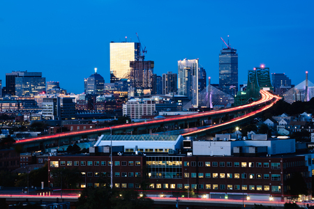 Boston city skyline with Boston bridges and highways at dusk, Boston Massachusetts USAの写真素材