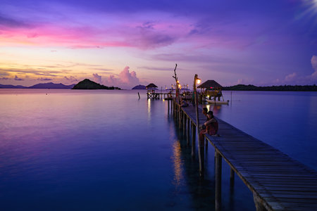 Wooden bridge at dusk Koh Mak, Trat Thailandの写真素材