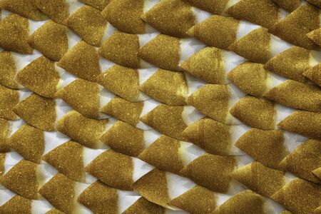 Gold paper on white background