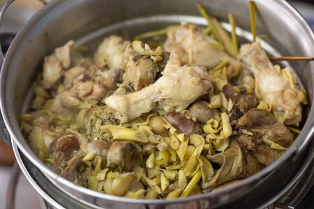 Thai food cooking healthy food,steamed chicken with lemongrass and herbs in a hot potの写真素材