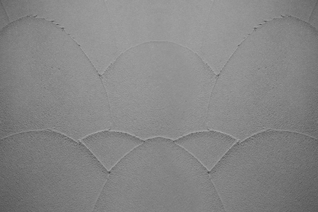 gray cement curve plaster pattern wall background.の写真素材