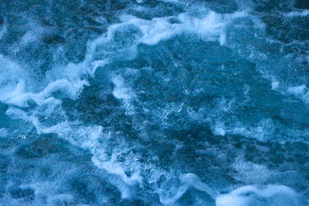 natural flowing blue water river.の写真素材