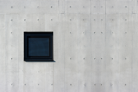 square glass window on aged cement concrete wall background. for any vintage design work.