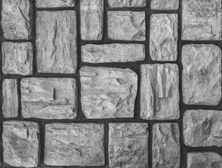 aged weathered stone paving walking way surface background.