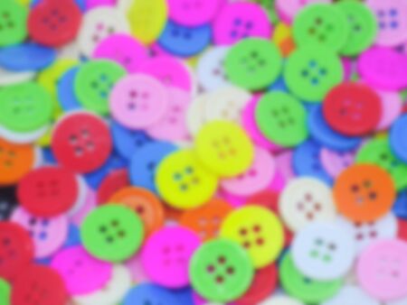 Blurred various color circle vintage buttons backgorund.の写真素材