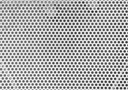 White metal mesh table surface wall background.の写真素材