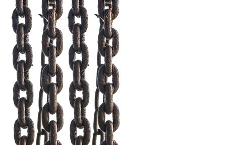 Rusty metal vertical chain on white background.の写真素材