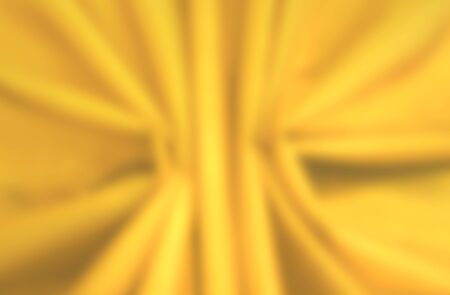 blurred golden curve art style fabric cloth wall background.の写真素材