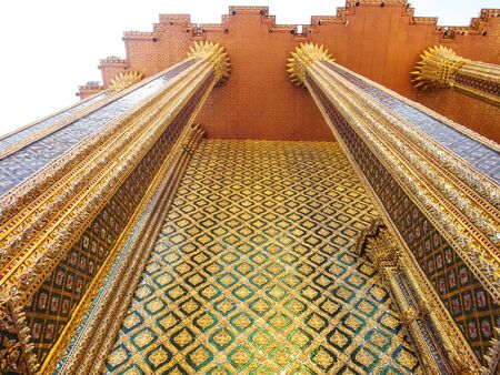 Traditional Thai art pattern Kanok wall of temple at Grand Palace Bangkok.