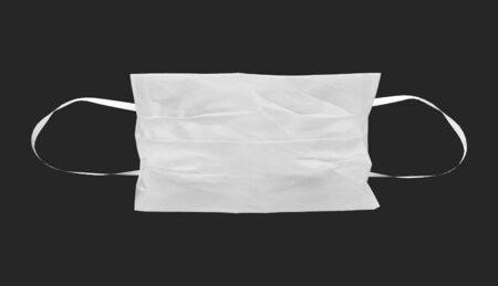 3d rendering. White Surgical face mask with clippin path isolated on black background.の写真素材