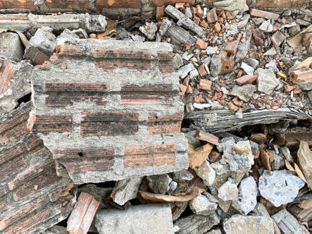 Old broken Brick pieces stack at construction site work place.