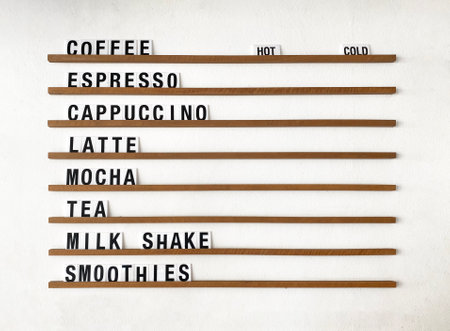Coffee menu's letter words on wood panel bar background.の写真素材