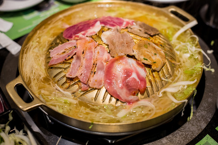 BBQ on Gold grilling iron pan, Asian Style.の写真素材