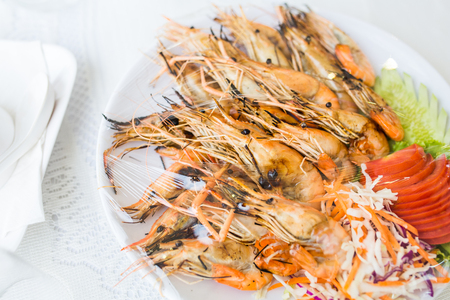 Fresh shrimp grill on on white plate, Thai seafood.の写真素材