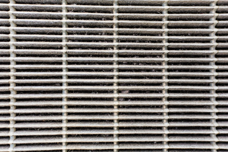 Technician is changing old air filter by mechanic in the car service.の写真素材