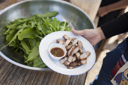 Pork grilled on white plateの写真素材