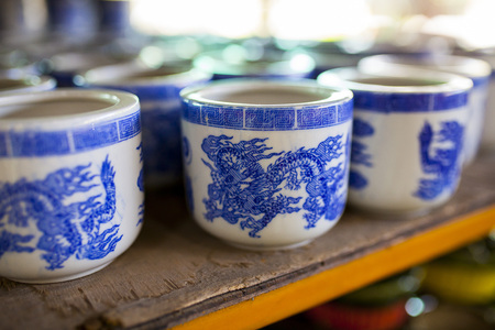 Ceramic cup on a shelf, ceramic products and industry in Thailandの写真素材