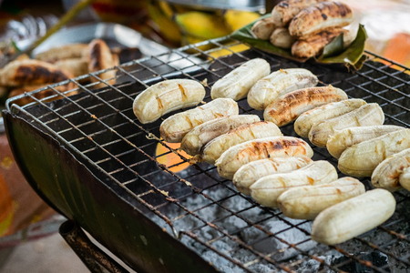 Banana charcoal fire or preheat a gas grill, Thai food Style.の写真素材
