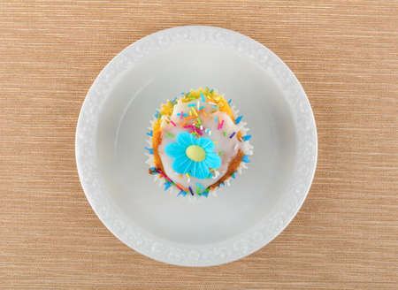 Colorful homemade muffin on a white plateの写真素材