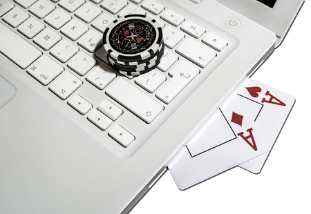 Online poker play, chips, cards and notebookの写真素材