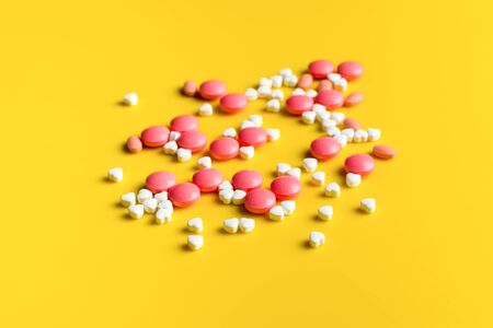 Love pills and tablets on backgroundの写真素材