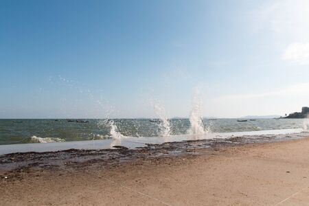 Wave of the sea on the sand beach