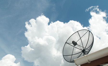 Satellite dish on the roofの写真素材