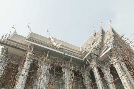 under construction temple with blue sky background Bangkok Thailandの写真素材